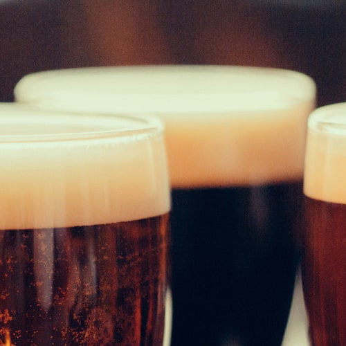 It's all beer. Why does the dark beer bubble go down?